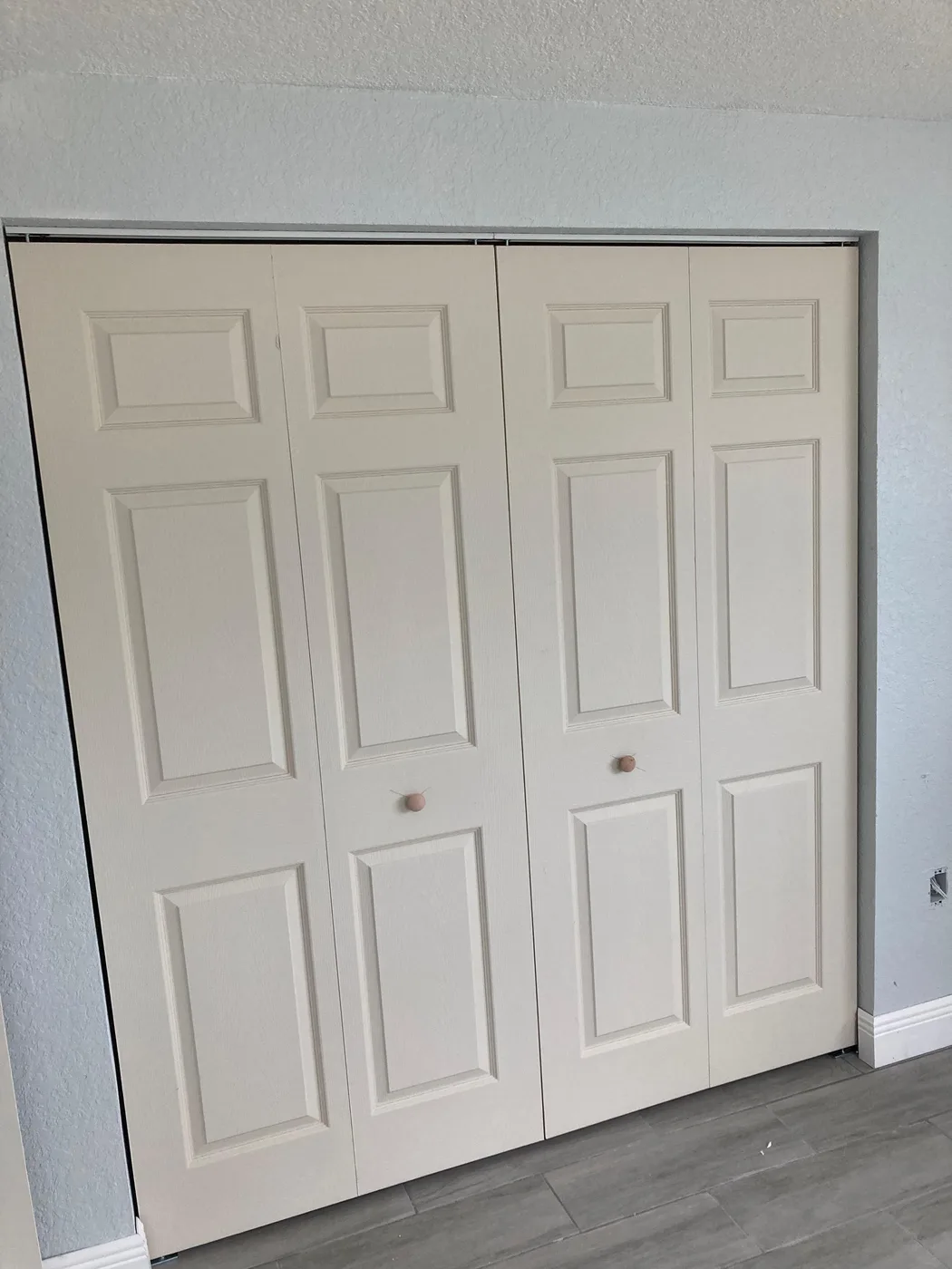New closet doors and trim installed